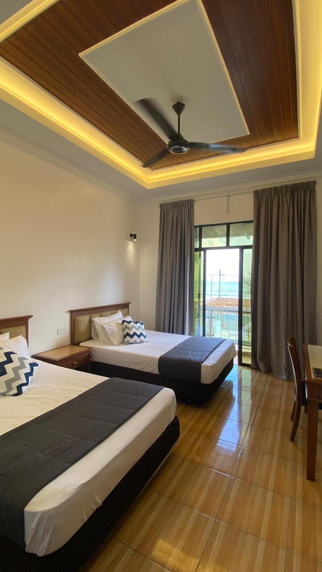 Eleven25 Roomstay Дунгун Экстерьер фото