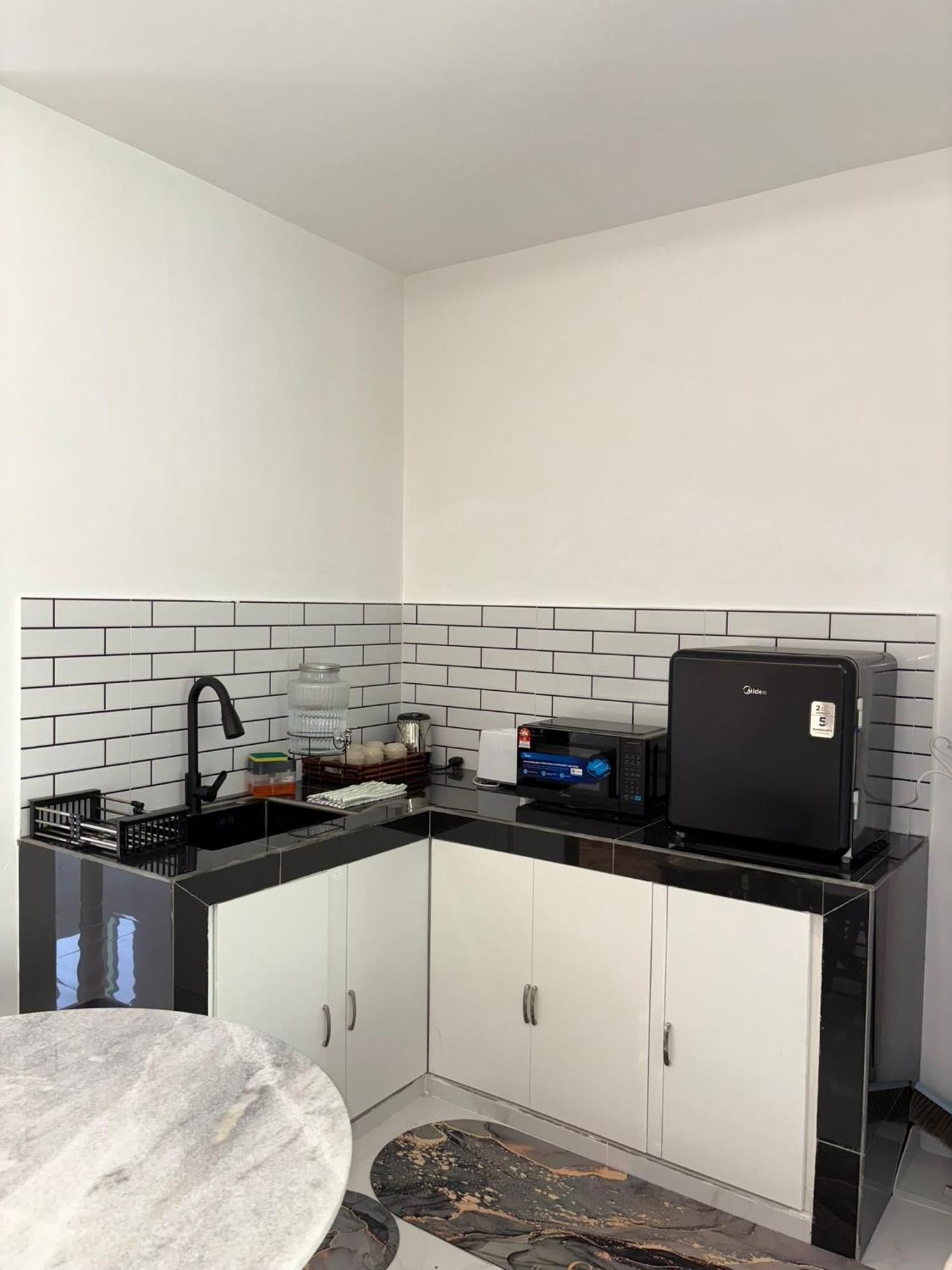 Eleven25 Roomstay Дунгун Экстерьер фото