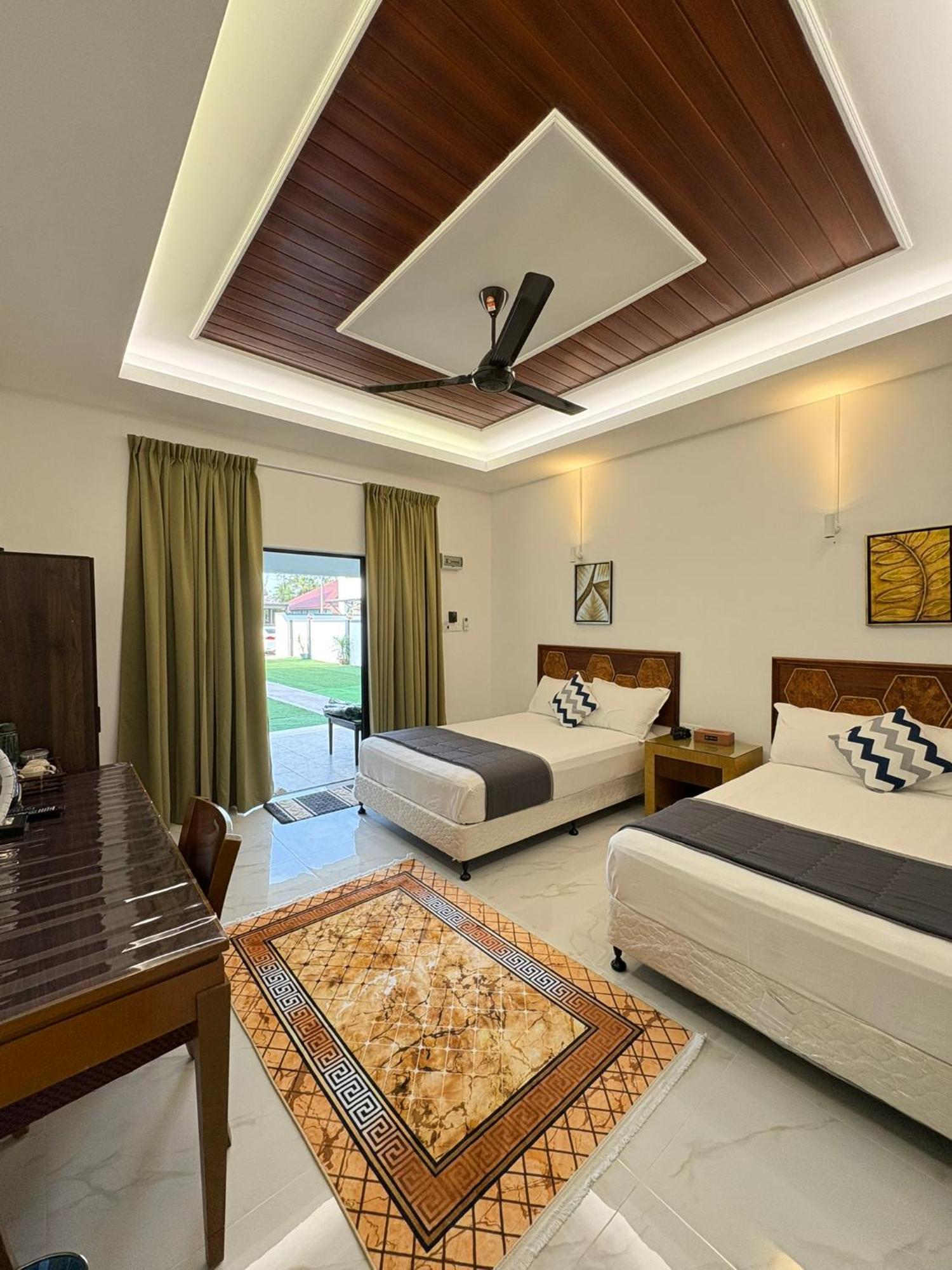 Eleven25 Roomstay Дунгун Экстерьер фото