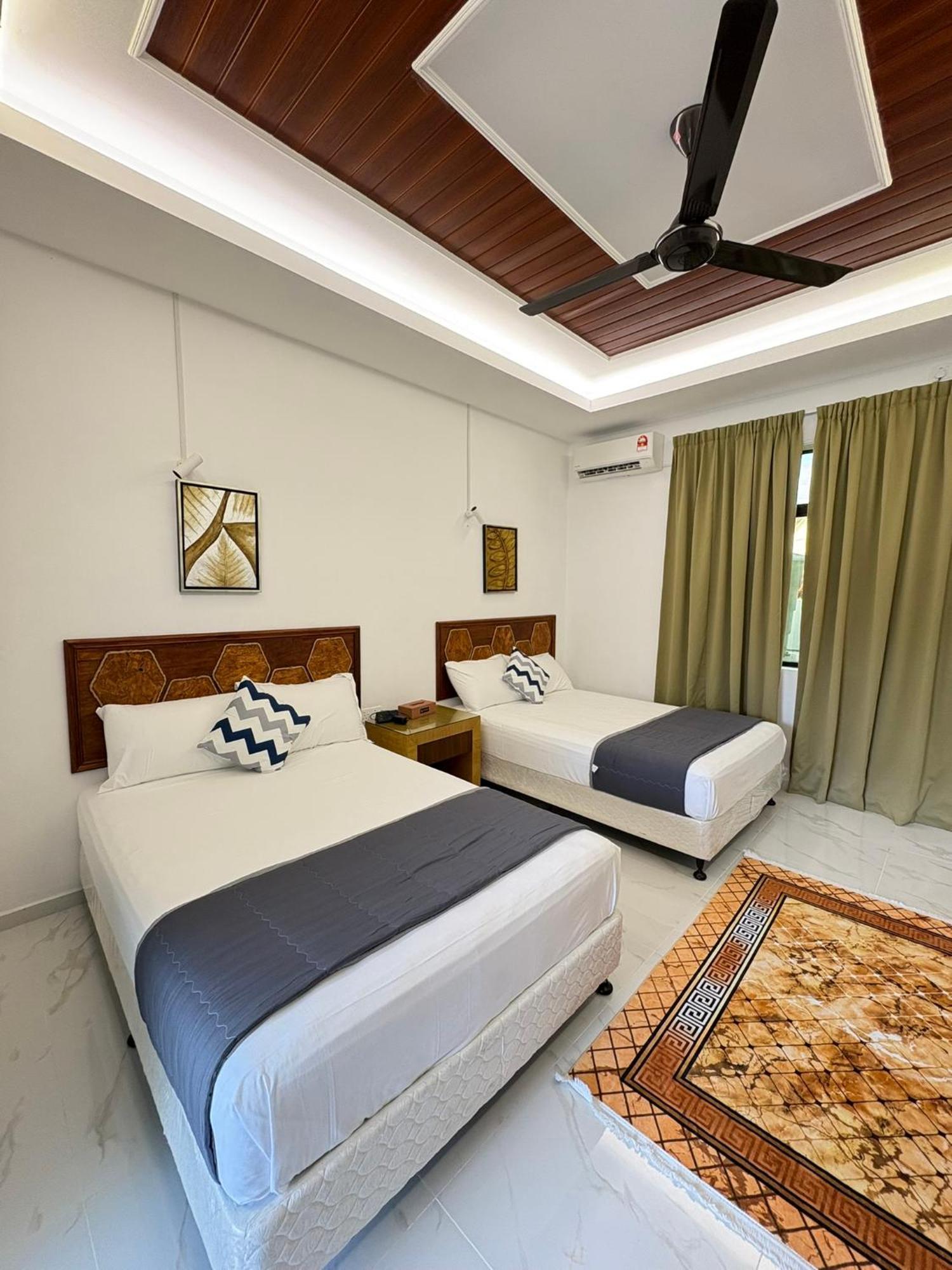 Eleven25 Roomstay Дунгун Экстерьер фото
